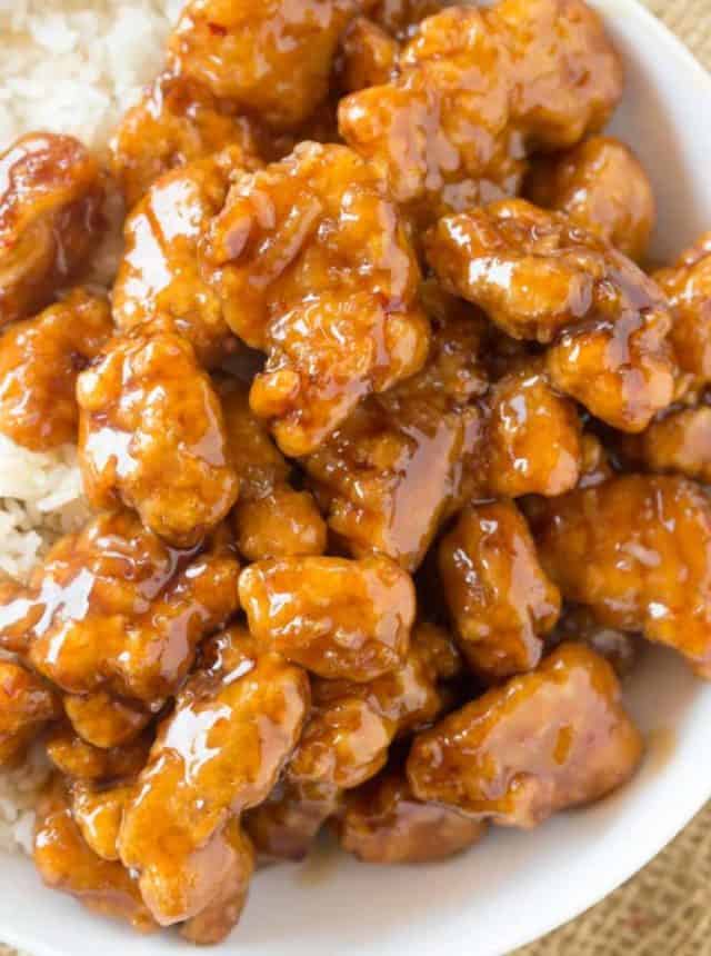 Panda Express Orange Chicken with tender chicken thighs fried crisp and tossed in a magical perfect-copycat sauce!